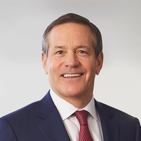 John Taft professional headshot with gray background.